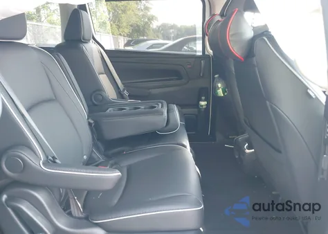 2025 Honda Odyssey Elite z USA, uszkodzony, nr VIN 5FNRL6H98SB036043